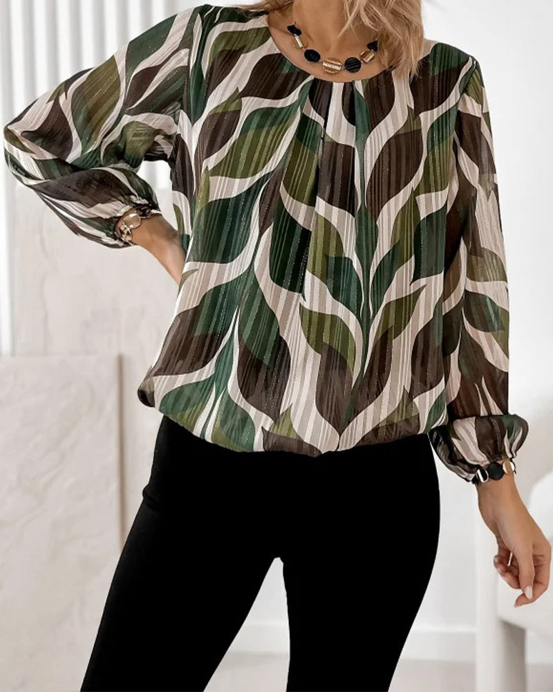 BLUSA CON MANGAS GLOBO Y CUELLO REDONDO