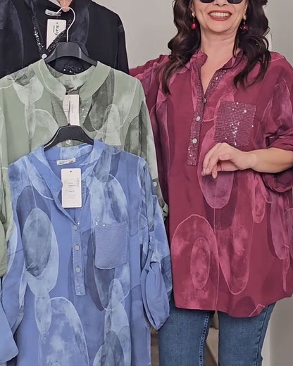 BLUSA ABOTONADA ESTAMPADA BOLSILLO