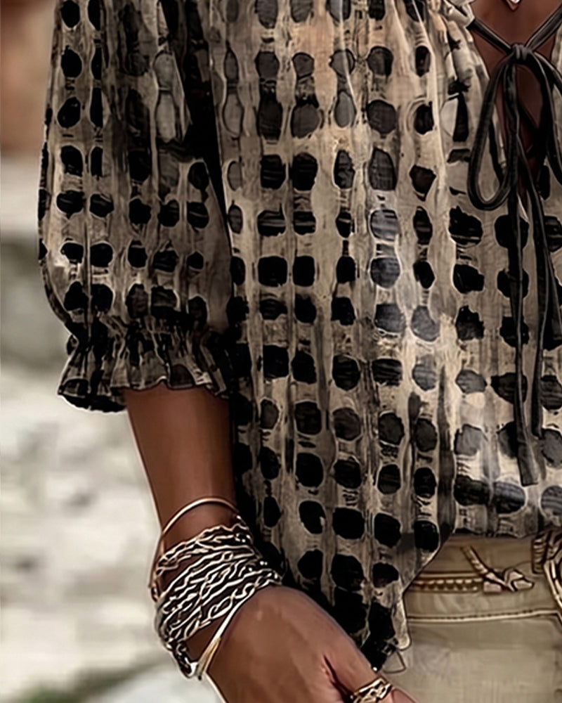 BLUSA DE LUNARES CON CORDONES