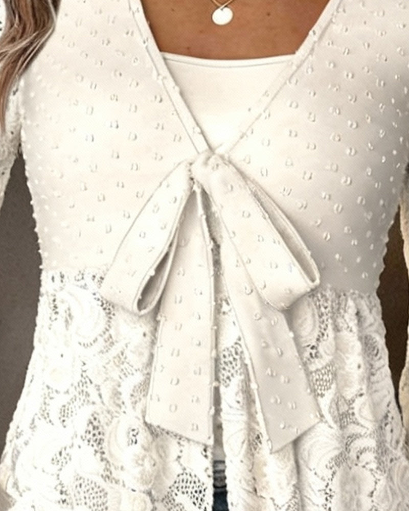 BLUSA LISA CON MANGAS GLOBO Y CUELLO DE V