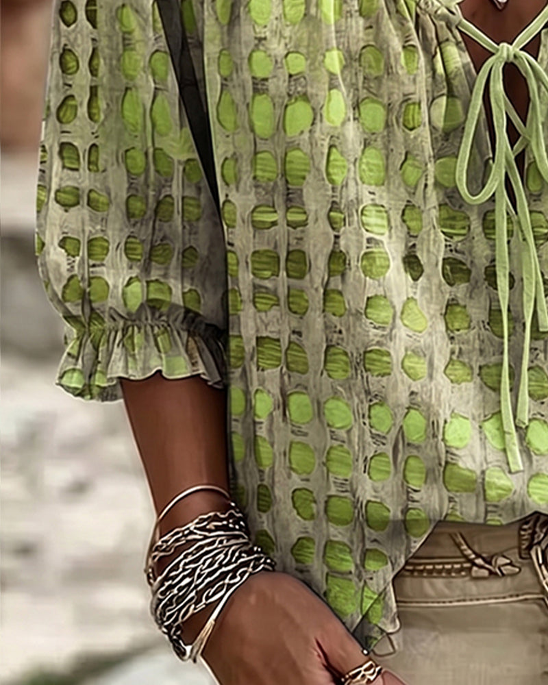 BLUSA DE LUNARES CON CORDONES