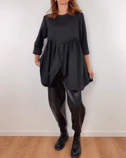 BLUSA LÍNEA A ASIMÉTRICA PLISADO