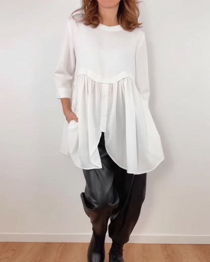 BLUSA LÍNEA A ASIMÉTRICA PLISADO