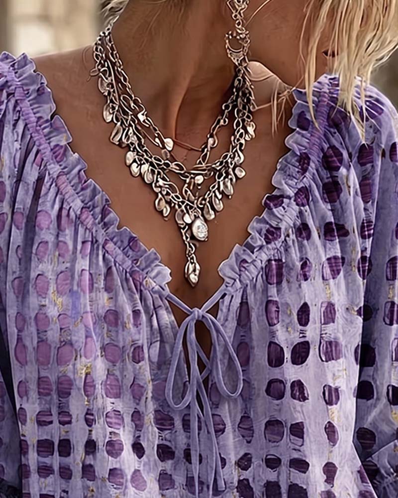 BLUSA DE LUNARES CON CORDONES