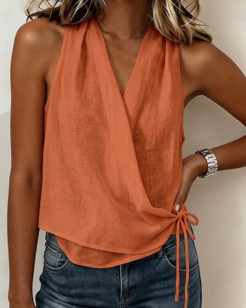BLUSA LISA SIN MANGAS ESCOTE LAZO CUELLO