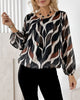 BLUSA CON MANGAS GLOBO Y CUELLO REDONDO