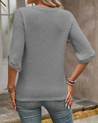 TOP CON ESTAMPADO GOFRE LISO CUELLO REDONDO