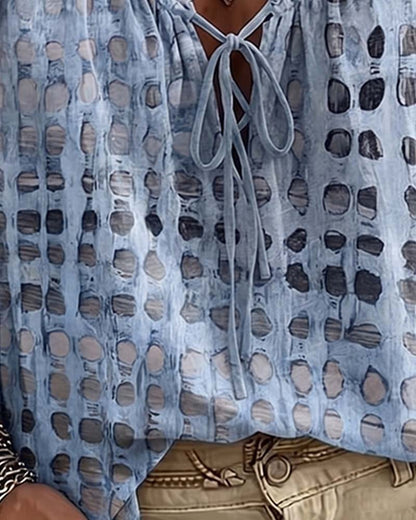 BLUSA DE LUNARES CON CORDONES