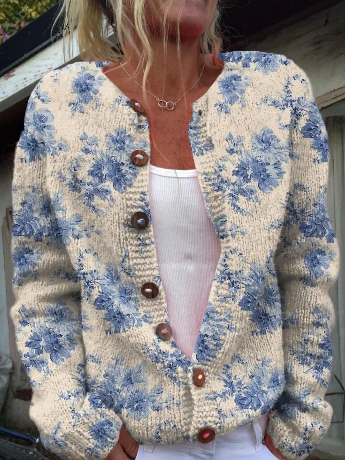 CÁRDIGAN ABOTONADO CON ESTAMPADO ARTÍSTICO FLORAL