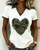 CAMISETA CUELLO BEBÉ CAMUFLAJE CORAZÓN
