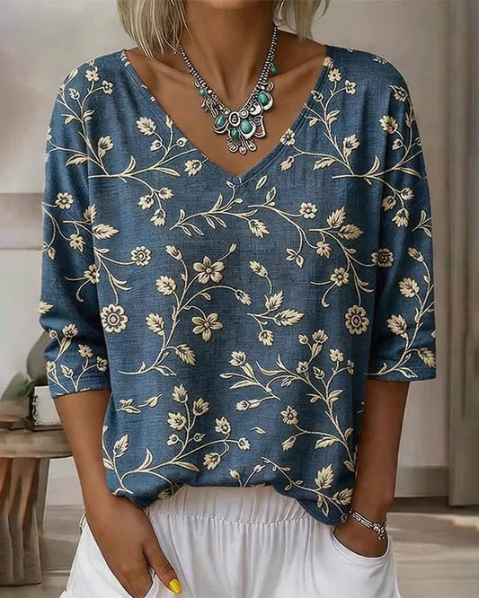 BLUSA CUELLO DE V MEDIO-MANGA FLORAL