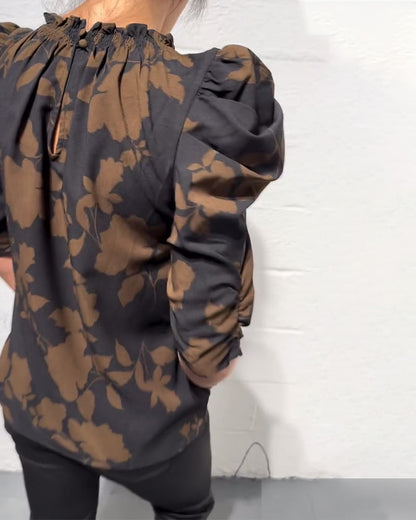 BLUSA MANGA ABULLONADA VOLANTE