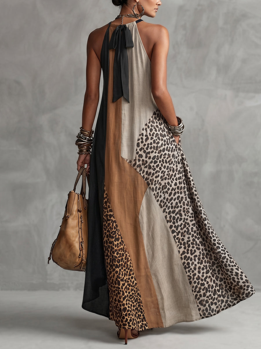 LUCIA | VESTIDO LARGO HALTER CON ESTAMPADO DE LEOPARDO Y DETALLES ASIMÉTRICOS