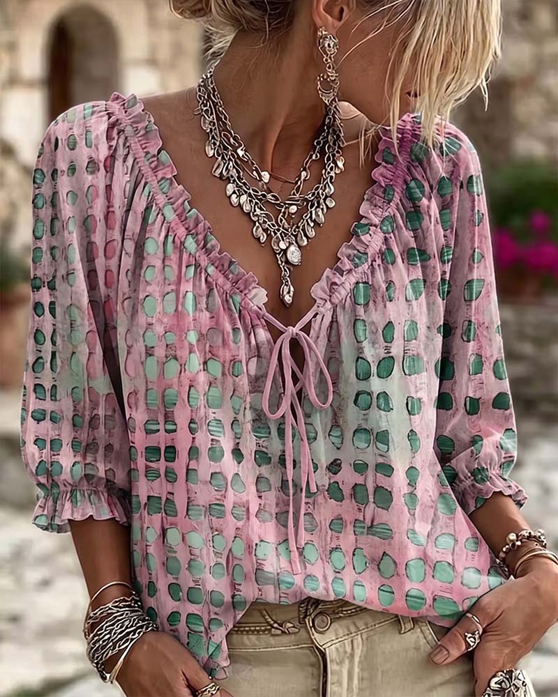 BLUSA DE LUNARES CON CORDONES