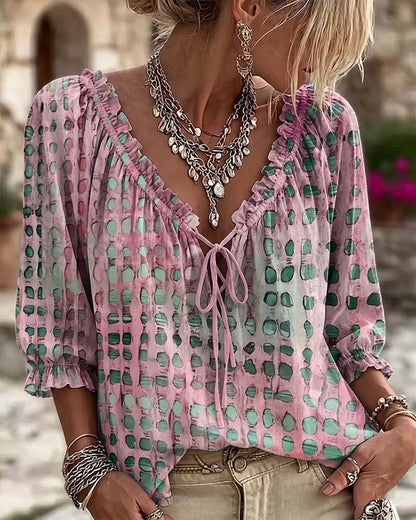BLUSA DE LUNARES CON CORDONES