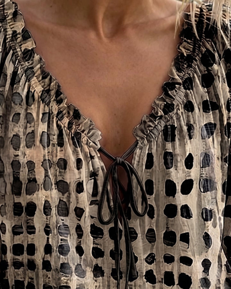BLUSA DE LUNARES CON CORDONES