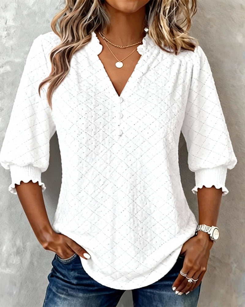 TOP CUELLO DE V ROMBOS MANGA CORTA