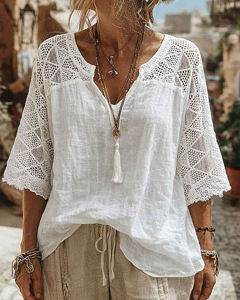 BLUSA LISA CON PANELES CUELLO DE V