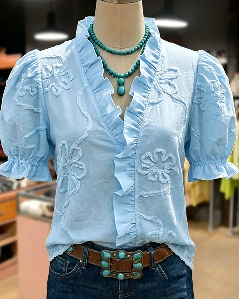 BLUSA CUELLO DE V BORDE CON VOLANTES MANGA ABULLONADA