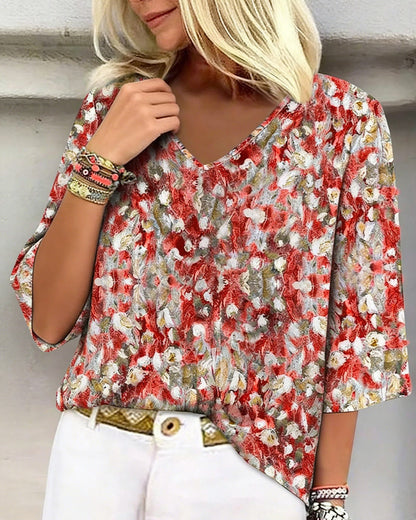 BLUSA ESTAMPADO FLORAL CUELLO DE V MANGA TRES CUARTOS
