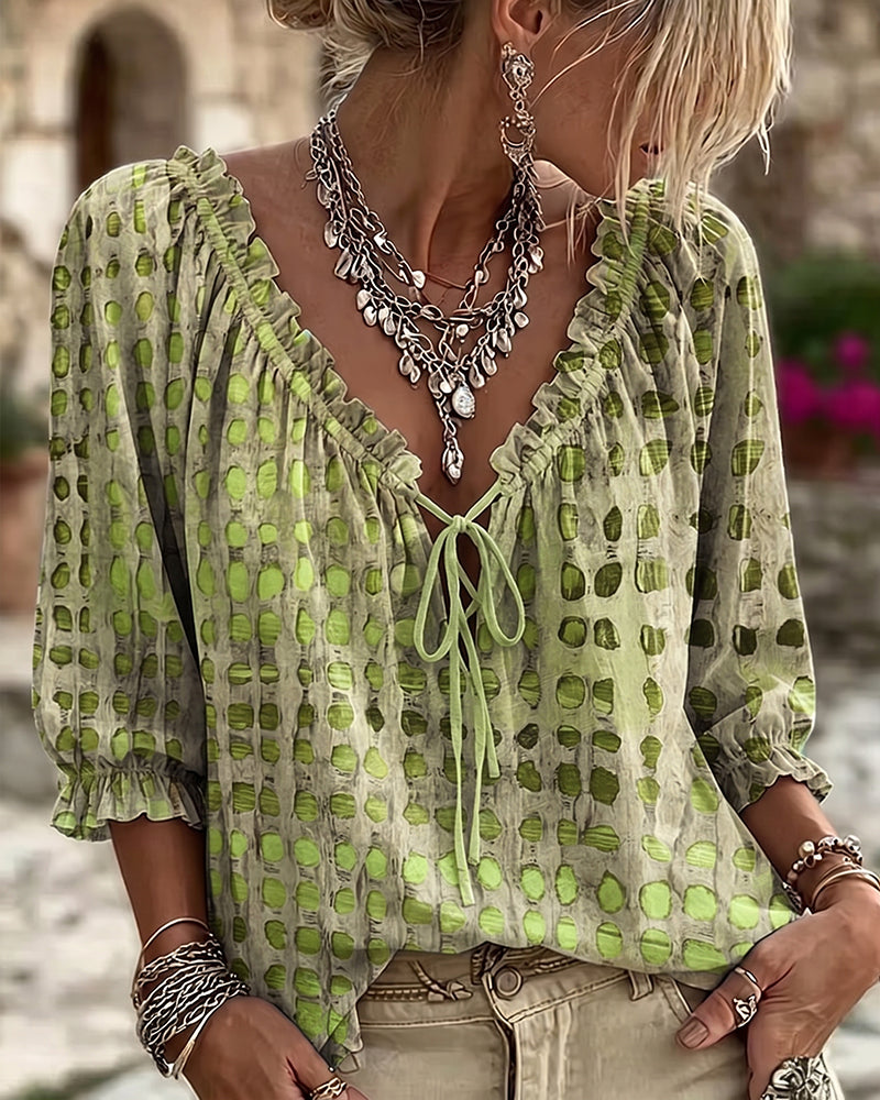 BLUSA DE LUNARES CON CORDONES