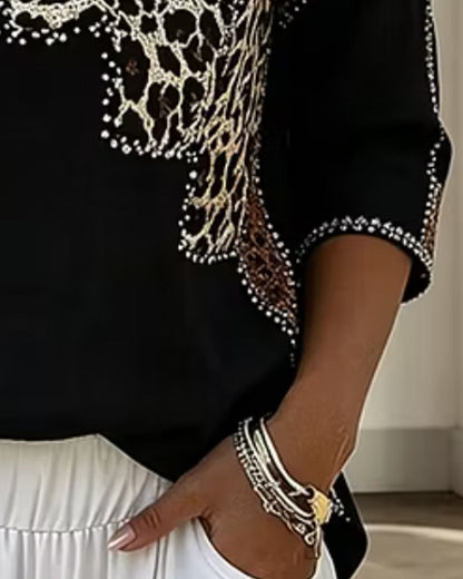 BLUSA CUELLO DE V LEOPARDO ESTAMPADO