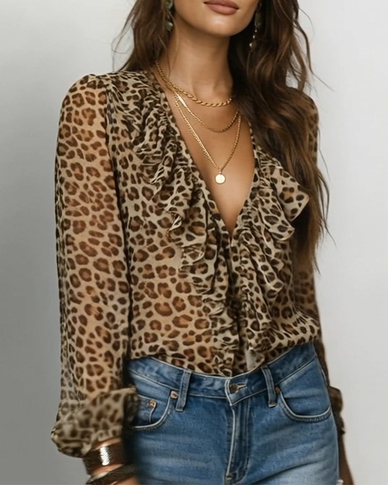 BLUSA CON VOLANTES CUELLO DE V ESTAMPADO DE LEOPARDO