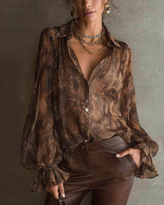 BLUSA CON LA MODERNO MANGA VOLANTE ESTAMPADA