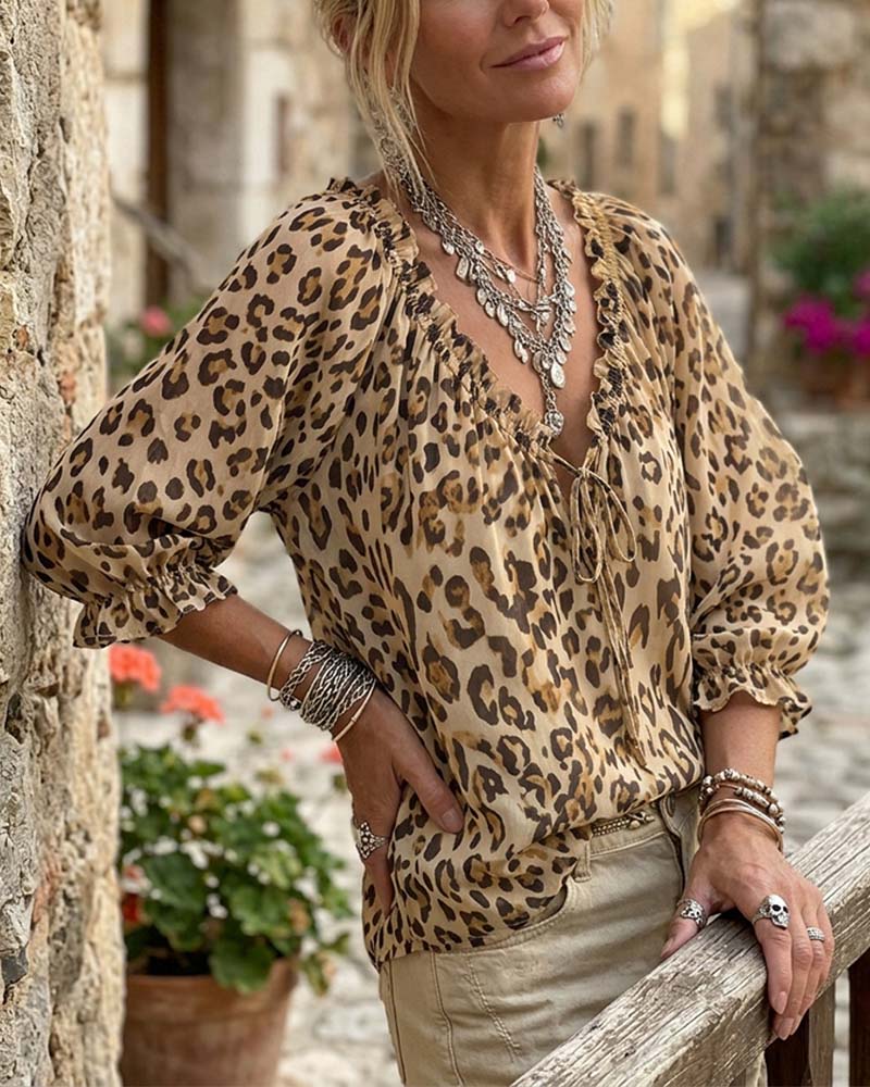 BLUSA ESTAMPADO DE LEOPARDO CUELLO DE V MANGAS ABULLONADAS CORDONES