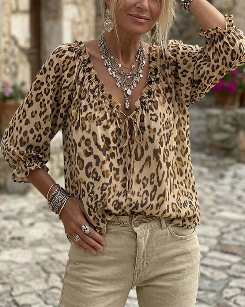 BLUSA ESTAMPADO DE LEOPARDO CUELLO DE V MANGAS ABULLONADAS CORDONES