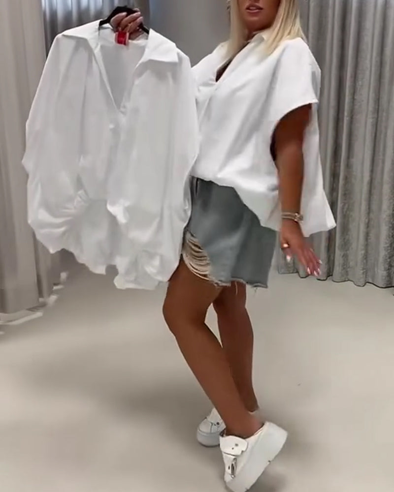 BLUSA CUELLO CORTE HOLGADO MANGA MURCIÉLAGO