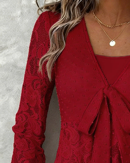 BLUSA LISA CON MANGAS GLOBO Y CUELLO DE V