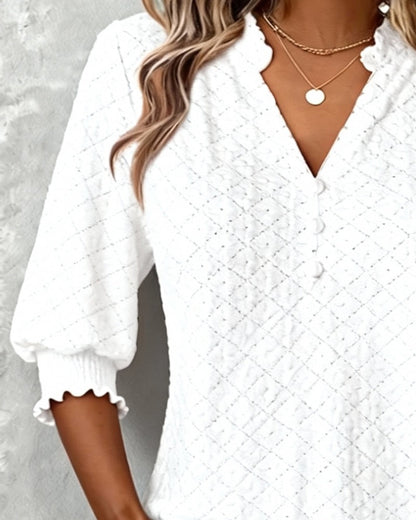 TOP CUELLO DE V ROMBOS MANGA CORTA