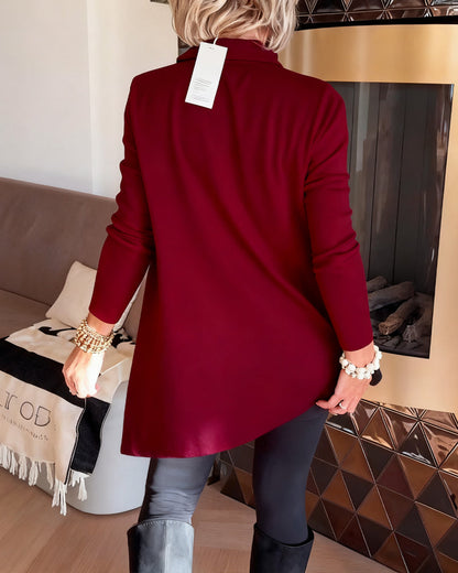 TOP CON CUELLO ASIMÉTRICO Y MANGA LARGA