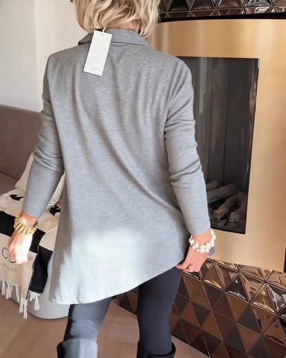 TOP CON CUELLO ASIMÉTRICO Y MANGA LARGA