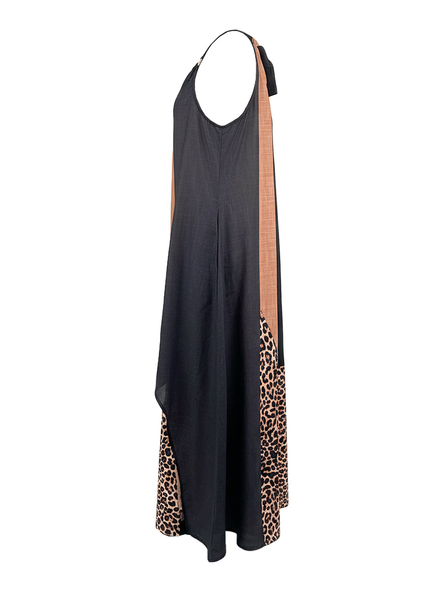 LUCIA | VESTIDO LARGO HALTER CON ESTAMPADO DE LEOPARDO Y DETALLES ASIMÉTRICOS