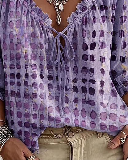 BLUSA DE LUNARES CON CORDONES