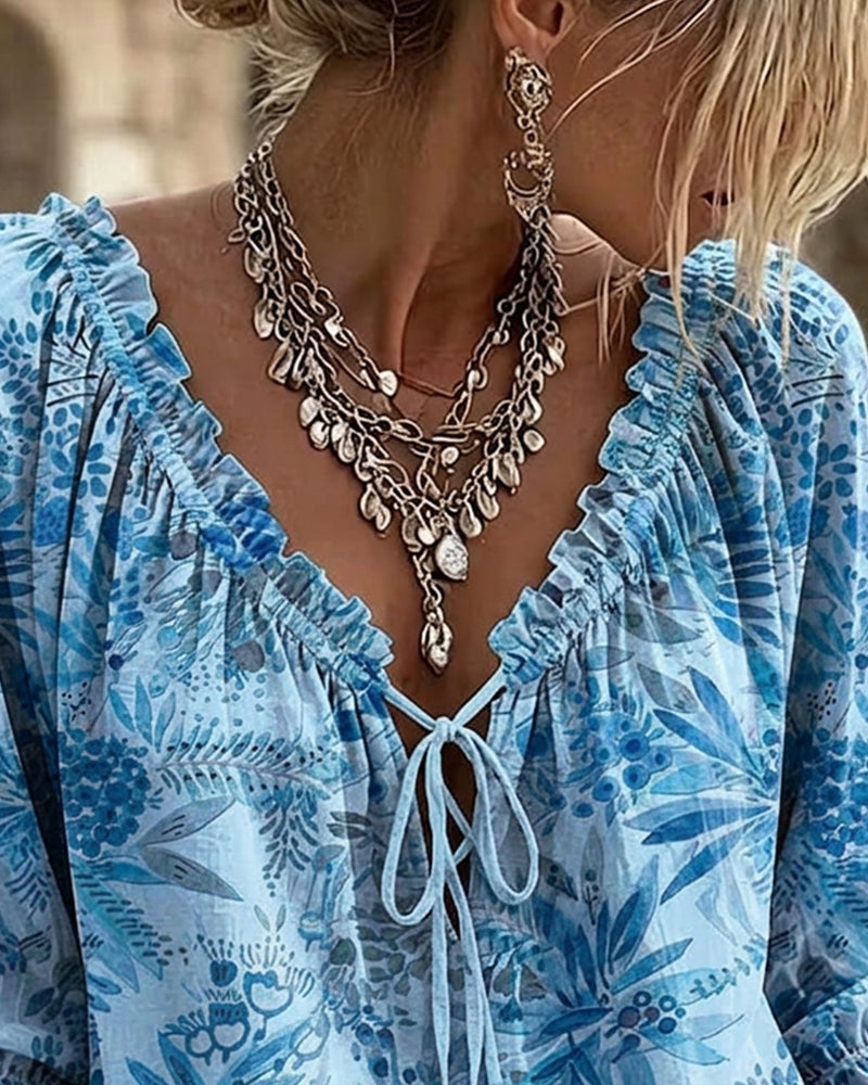 BLUSA CUELLO DE V CON CORDONES