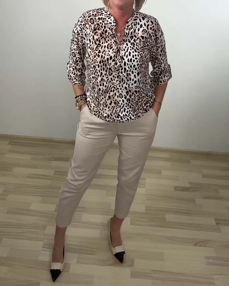 BLUSA CUELLO BEBÉ MODERNO LEOPARDO