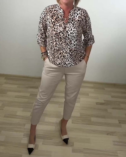 BLUSA CUELLO BEBÉ MODERNO LEOPARDO