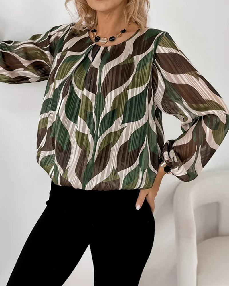 BLUSA CON MANGAS GLOBO Y CUELLO REDONDO