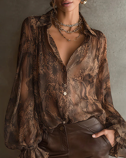 BLUSA CON LA MODERNO MANGA VOLANTE ESTAMPADA