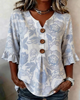 BLUSA ESTAMPADA PUÑO CON VOLANTES