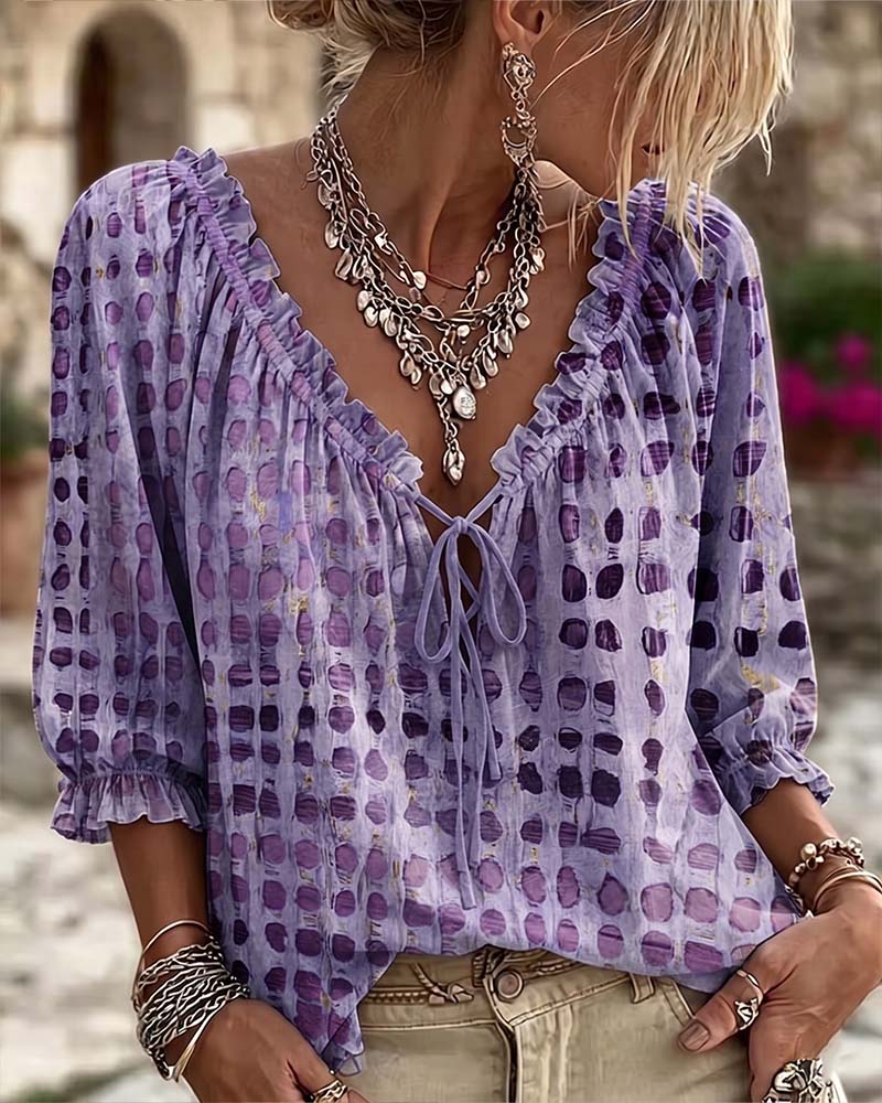 BLUSA DE LUNARES CON CORDONES