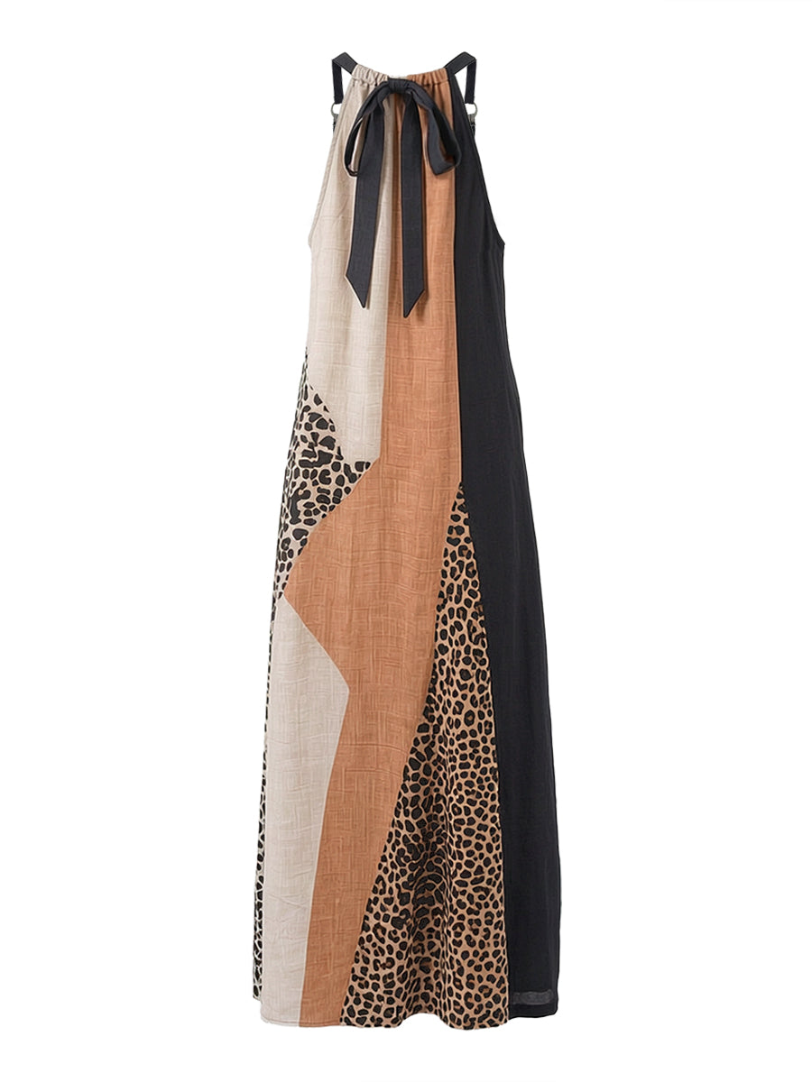 LUCIA | VESTIDO LARGO HALTER CON ESTAMPADO DE LEOPARDO Y DETALLES ASIMÉTRICOS
