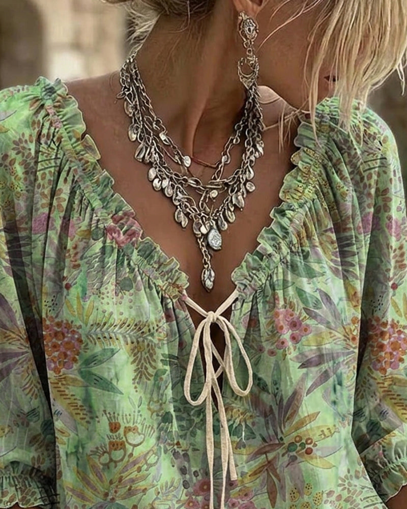 BLUSA CUELLO DE V CON CORDONES