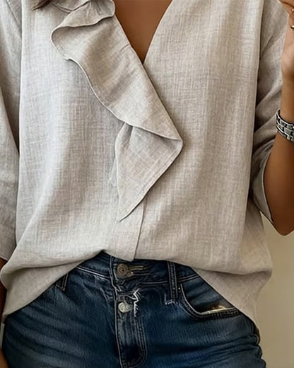 BLUSA CON VOLANTES LISA MANGA LARGA