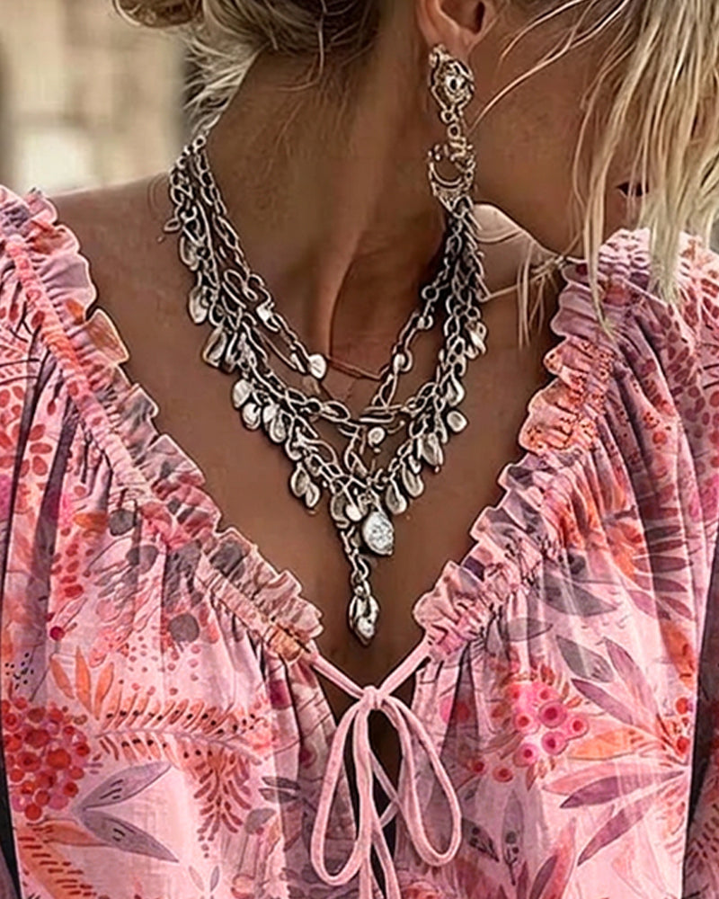 BLUSA CUELLO DE V CON CORDONES