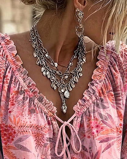BLUSA CUELLO DE V CON CORDONES