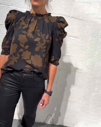 BLUSA MANGA ABULLONADA VOLANTE